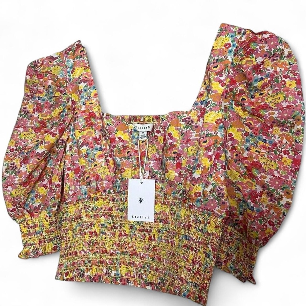 NWT multi-colored floral pleated top with puff sleeves beautiful smocking